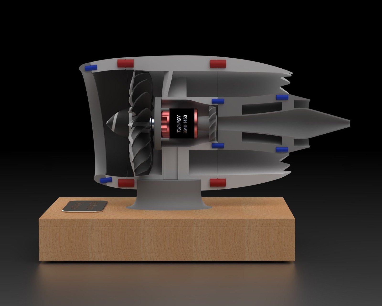 Cutaway render of the engine on its base, showing the fan, the Turnigy 3648-1450 brushless motor at the core, the pins joining the body sections, and the exhaust cone.