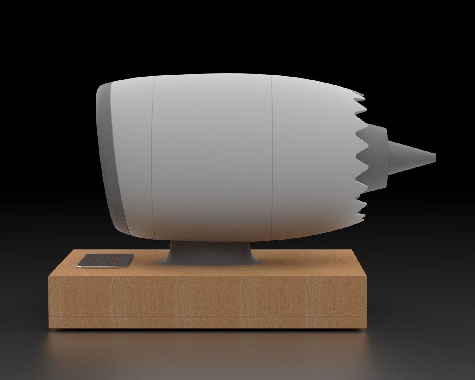 Side-profile render of the engine, showing the long white nacelle, the chevron edge at the exhaust, and the tail cone.