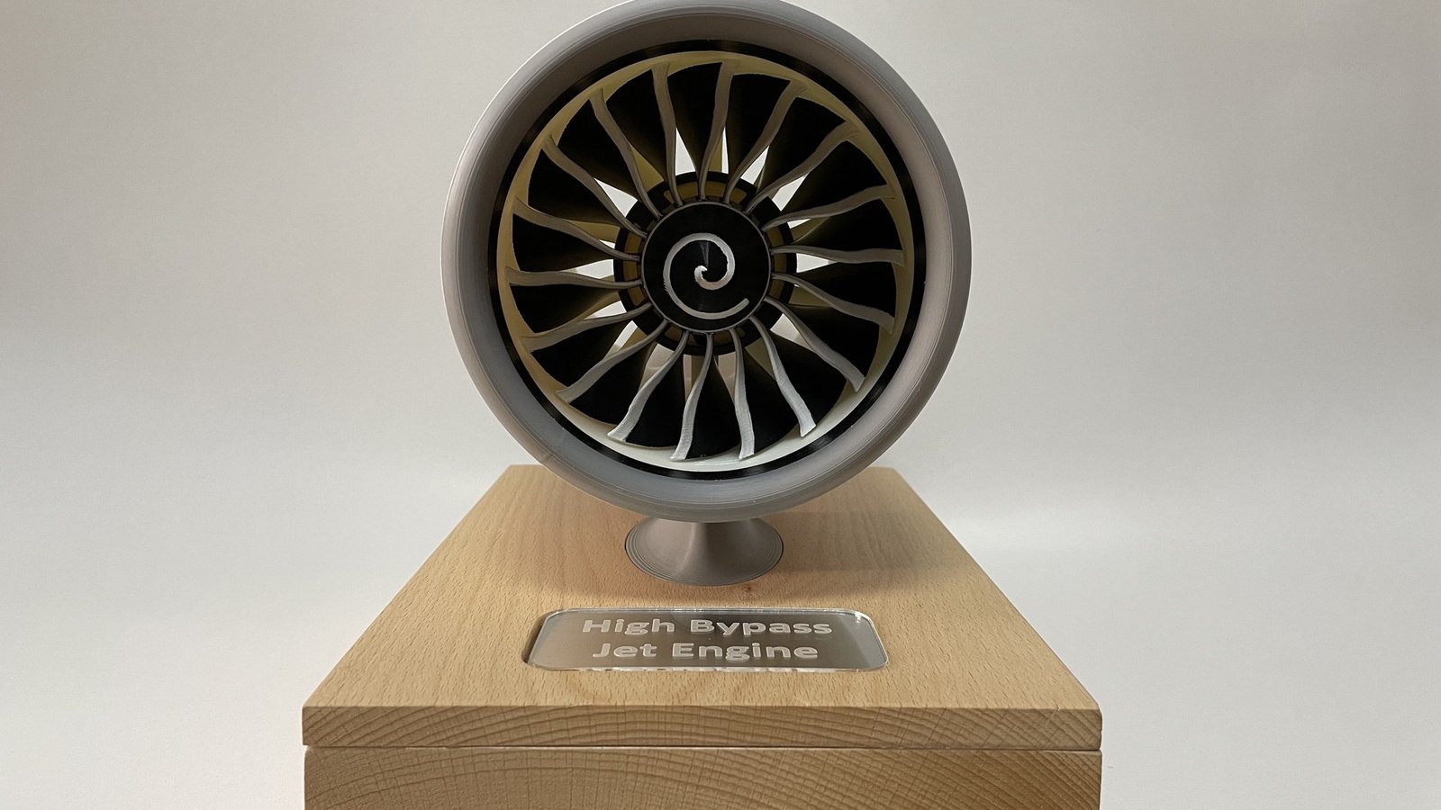 The finished engine head-on, showing the fan and the spiral spinner above the plaque.