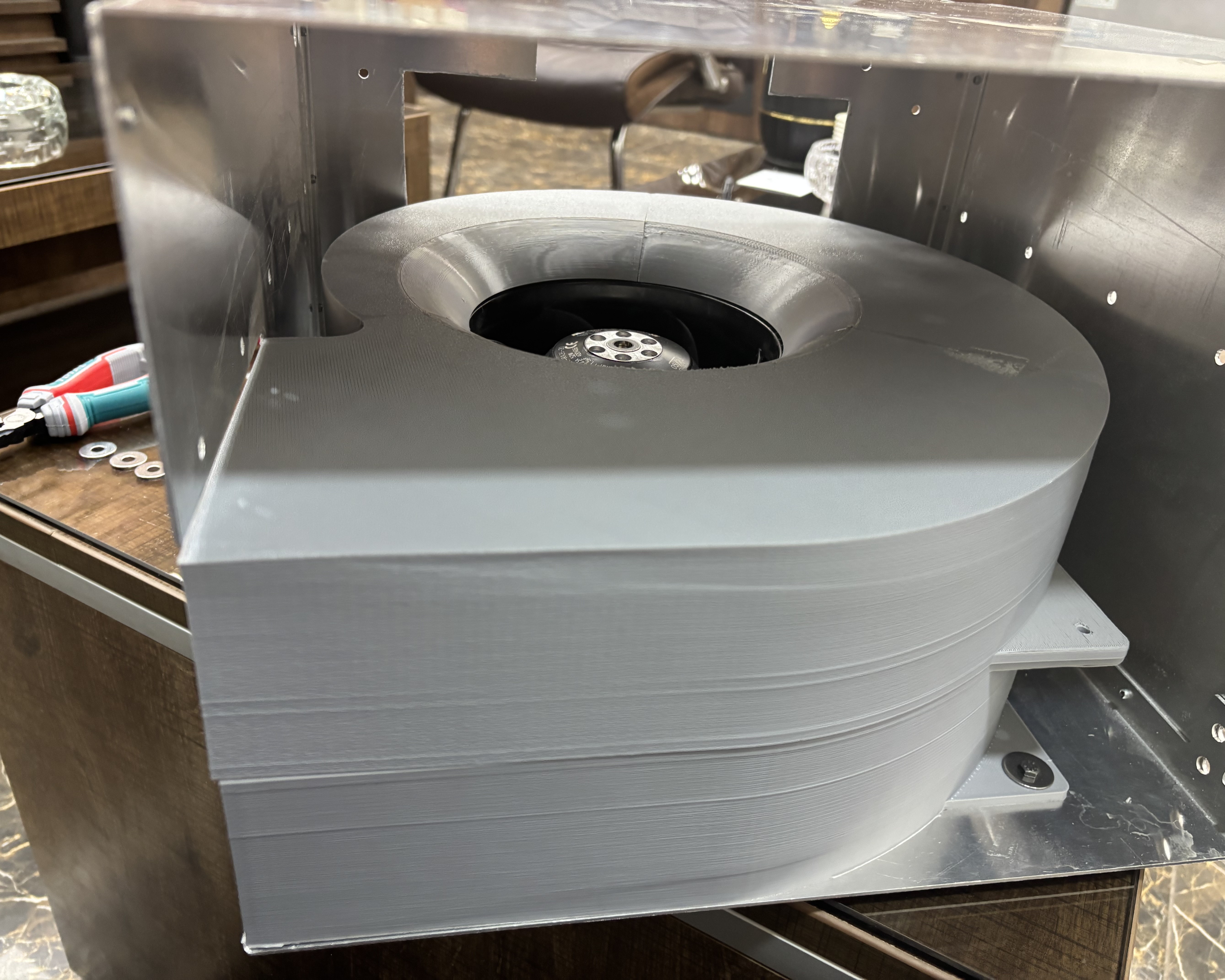 The assembled scroll housing fitted into the case.